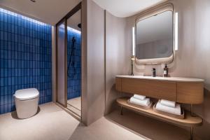Ένα μπάνιο στο Crystal Orange Shanghai Lujiazui Financial Center Hotel