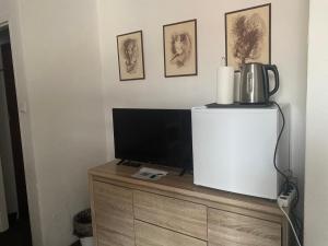 Телевизор и/или развлекательный центр в Levné ubytování Ostrava