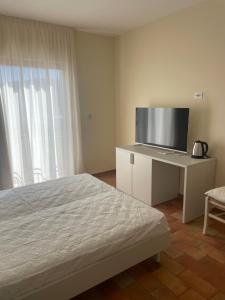 Postel nebo postele na pokoji v ubytování Bellavista Rooms