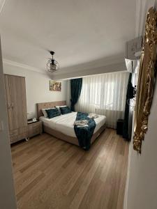 Ένα ή περισσότερα κρεβάτια σε δωμάτιο στο Hotel Estambul