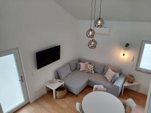 Posezení v ubytování Ferienhaus Weinstraße - Pfälzer Wald