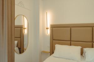 Letto o letti in una camera di Grillo Suite