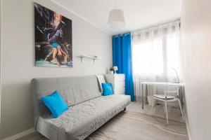 Posteľ alebo postele v izbe v ubytovaní Apartamenty Startowa Gdańsk