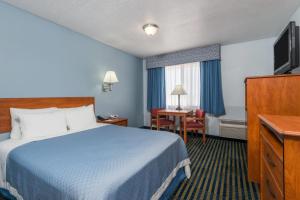 Katil atau katil-katil dalam bilik di Days Inn by Wyndham Las Vegas