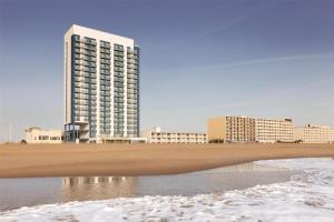 a view of a city with a beach and buildings at Hyatt House Virginia Beach / Oceanfront in Virginia Beach