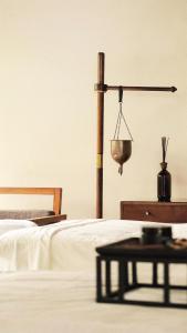 Кровать или кровати в номере Alila Ubud
