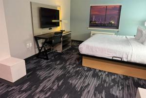 Voodi või voodid majutusasutuse Baymont by Wyndham Texas City toas