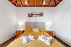 Postel nebo postele na pokoji v ubytování Casa Óscar + 37 fotografií