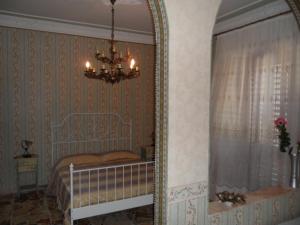 A bed or beds in a room at IL B&B Maison Graziella