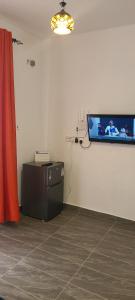TV a/nebo společenská místnost v ubytování Nestabs Homes