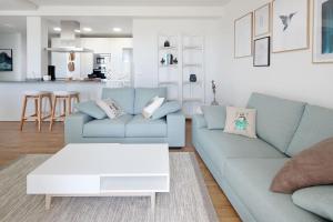 Część wypoczynkowa w obiekcie H SUITE3B by Smiling Rentals