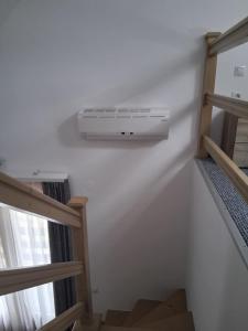 a room with a air conditioner on the wall at Casa Dora in Sovata