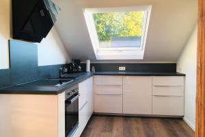 Kuchyň nebo kuchyňský kout v ubytování Ferienwohnung Wahl + 9 fotografií