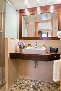 A bathroom at Wello Apartments