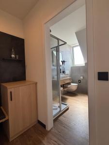 Postel nebo postele na pokoji v ubytování Hotel am Stadthaus