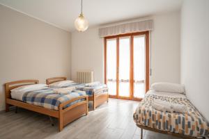 Postel nebo postele na pokoji v ubytování Spacious apartment with panoramic view