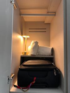 Postel nebo postele na pokoji v ubytování Literal Hotel