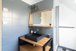Kuchyňa alebo kuchynka v ubytovaní La Maisonnette - Wifi - Parking