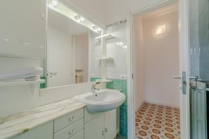 Koupelna v ubytování GuestHost - Cozy Flat in the Heart of Rapallo + 8 fotografií