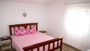 Postel nebo postele na pokoji v ubytování Apartment Lavanda with three bedrooms - TA Leut Agency