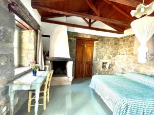 Кровать или кровати в номере Jasmine Village House