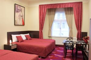 Postel nebo postele na pokoji v ubytování Anyday Apartments