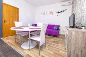 Kuchyň nebo kuchyňský kout v ubytování Apartments Olivera