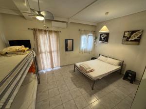 Ένα ή περισσότερα κρεβάτια σε δωμάτιο στο Seaside Apartments & Rooms Kampouri