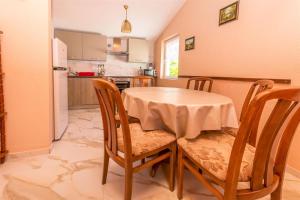 Kuchyň nebo kuchyňský kout v ubytování Apartments Olivera