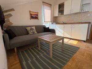 Kuchyňa alebo kuchynka v ubytovaní Apartments Neno