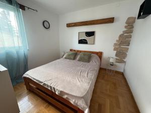 Posteľ alebo postele v izbe v ubytovaní Apartments Neno