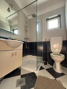 Kúpeľňa v ubytovaní Apartments Neno