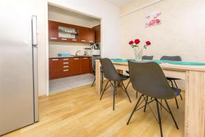 Kuchyň nebo kuchyňský kout v ubytování Apartments Olivera