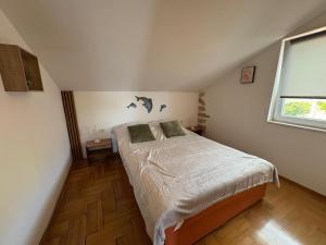 Posteľ alebo postele v izbe v ubytovaní Apartments Neno