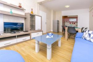 TV a/nebo společenská místnost v ubytování Apartments Olivera