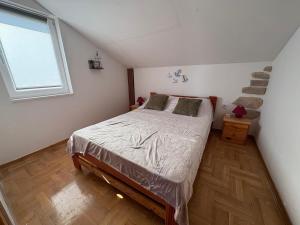 Posteľ alebo postele v izbe v ubytovaní Apartments Neno