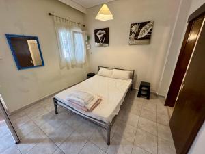 Ένα ή περισσότερα κρεβάτια σε δωμάτιο στο Seaside Apartments & Rooms Kampouri