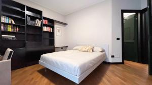 Postel nebo postele na pokoji v ubytování Casa Fiore - Affitti Brevi Italia