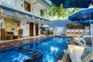 Piscina a Helloworld- Calangute- Casa Kiara o a prop