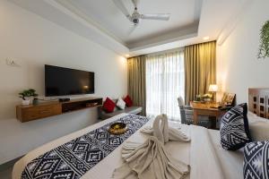 Llit o llits en una habitació de Helloworld- Calangute- Casa Kiara