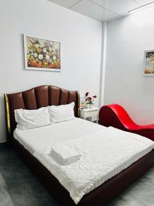 Postel nebo postele na pokoji v ubytování Goku Hotel