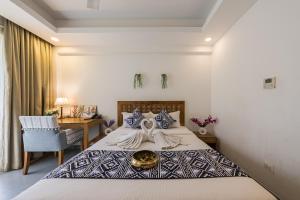 Llit o llits en una habitació de Helloworld- Calangute- Casa Kiara