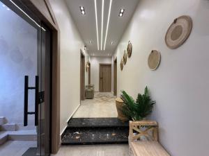 Ένα ή περισσότερα κρεβάτια σε δωμάτιο στο New Cairo Chic Studio 2