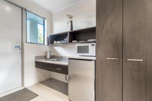 Kuchyň nebo kuchyňský kout v ubytování Dannemora Motor Inn