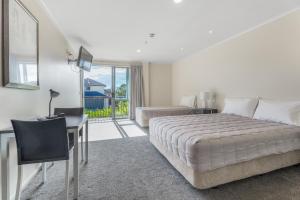 Postel nebo postele na pokoji v ubytování Dannemora Motor Inn