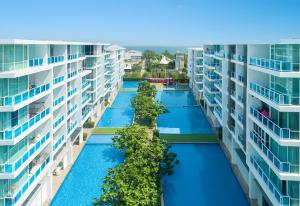 Bazén v ubytování My Resort Hua Hin - Top Floor, 104m2, Terrace, 8 Pools, 5 Min Beach & Cicada nebo v jeho okolí