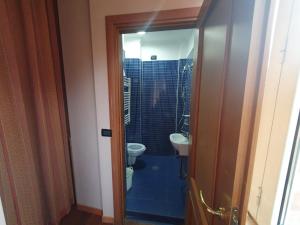 a bathroom with a toilet and a sink at Beauty Rooms in Rome