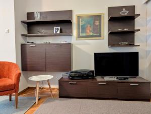 A television and/or entertainment centre at Thessaloniki Waterfront apartment