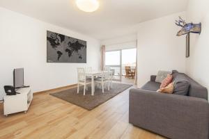 Ruang duduk di Village of Luz Apartment