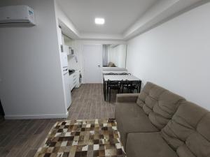 ครัวหรือมุมครัวของ LOFT512 Maxplaza Canoas
